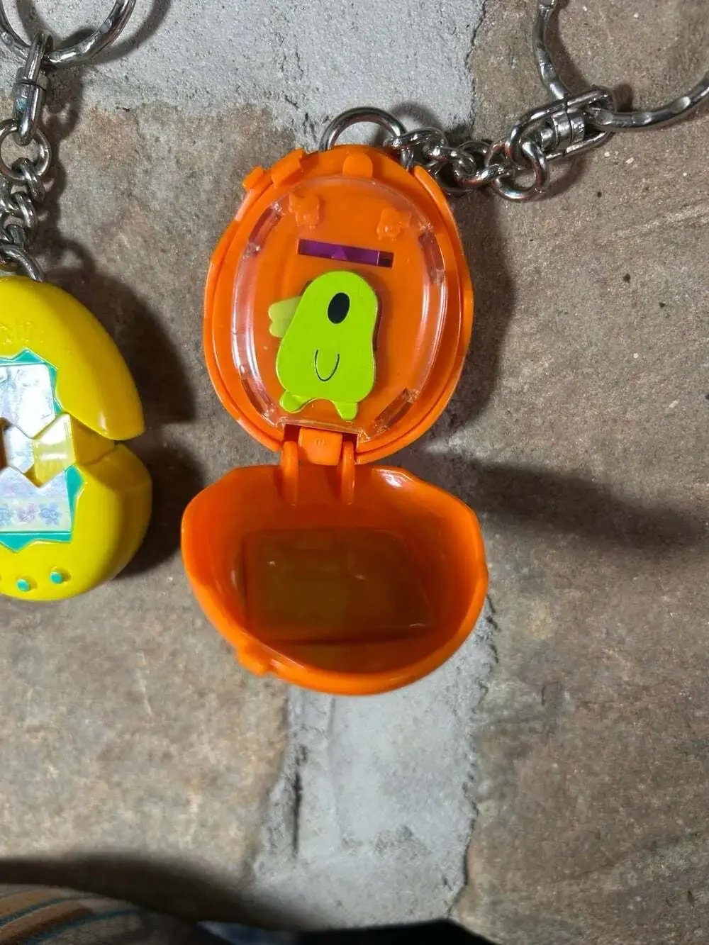 McDonalds Tamagotchi Keychains Orange and Yellow